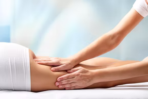 Therapist performing relaxation massage in a calm spa setting